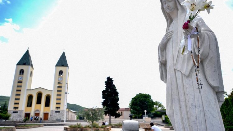 Statue of the Virgin Mary and St James Church in Medjugorje